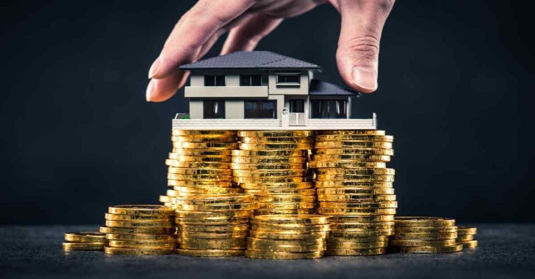 Investire in oro o nel settore immobiliare?